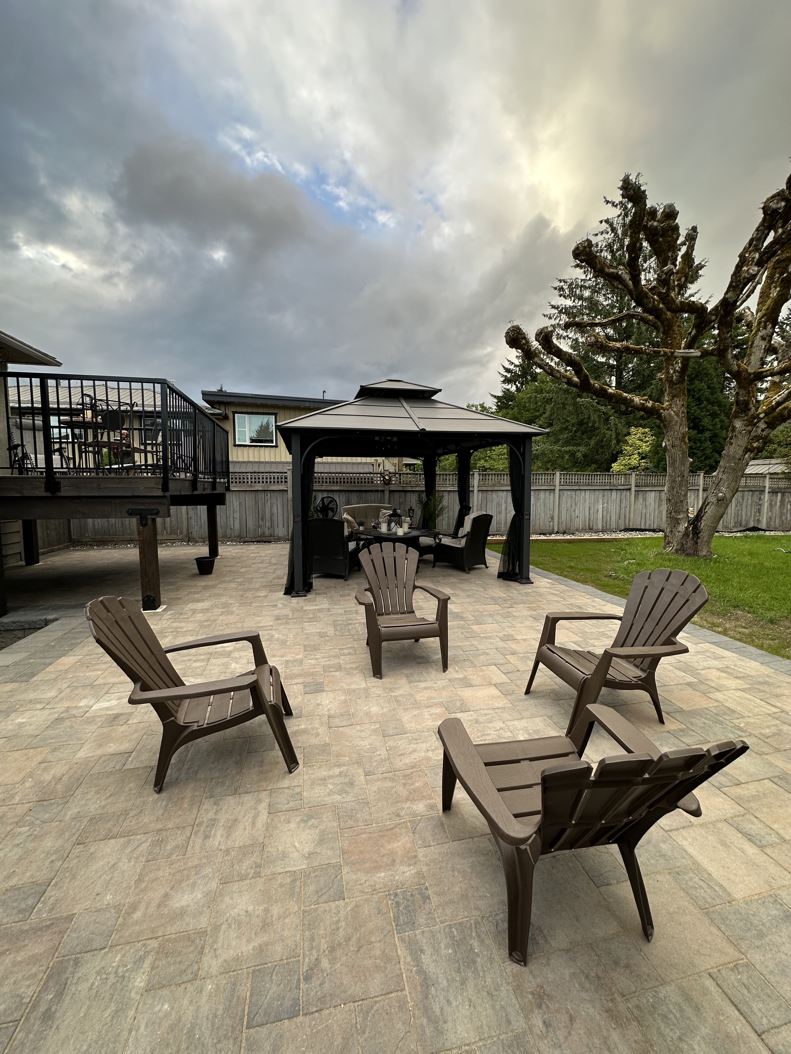 Outdoor Patio in Coquitlam with Interlocking pavers built by Benjamin Landscaping and Projects.  