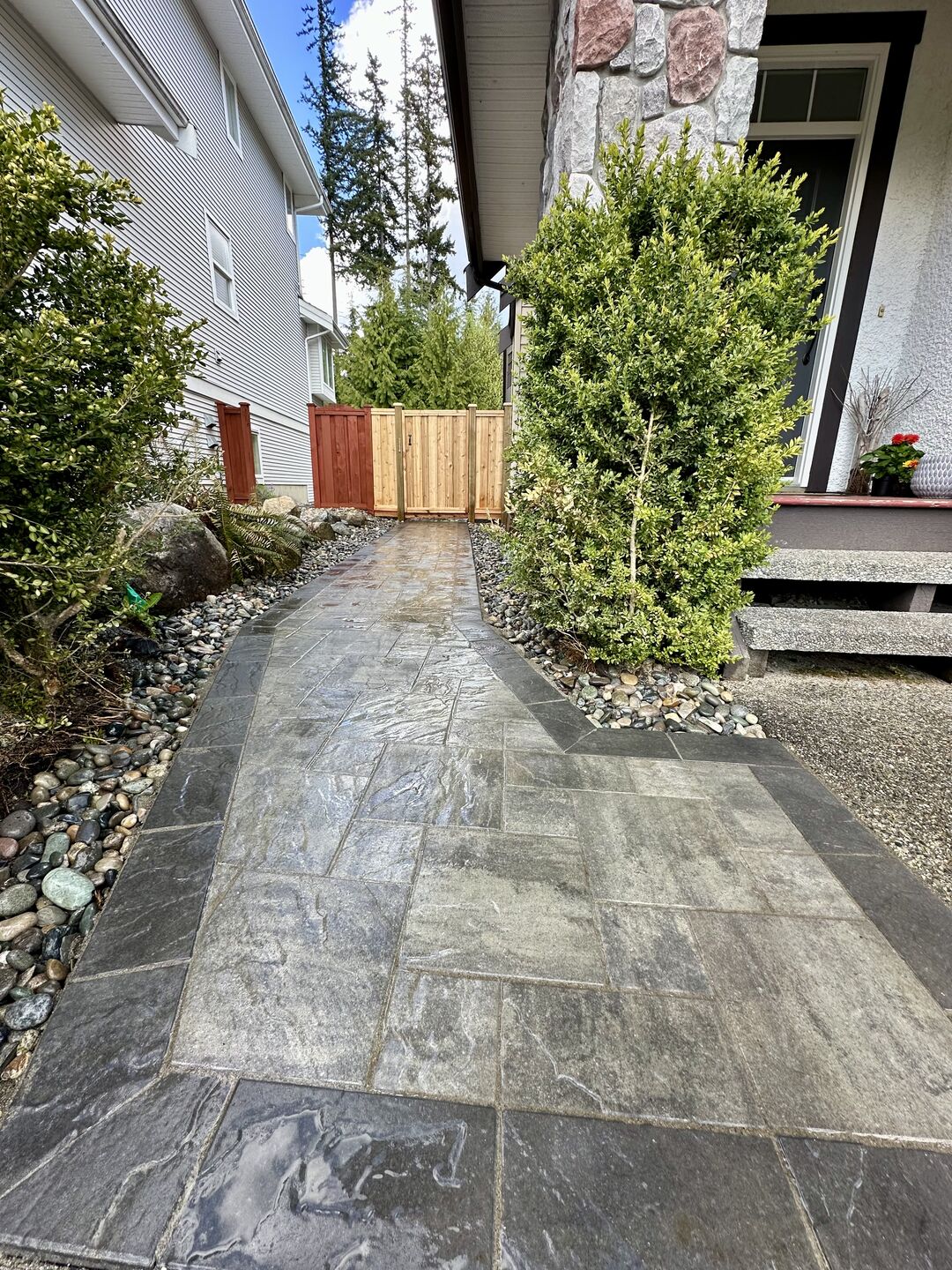 Interlocking paver walkway and gate in Port Moody. 