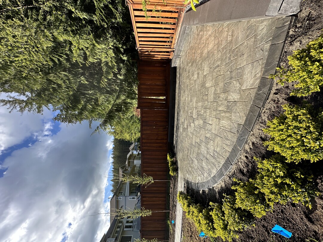 Interlocking paver patio and walkway installation in Port Moody. Landscape construction services in North Vancouver, West Vancouver, Coquitlam, White Rock, Surrey, Langley, Port Moody and Coquitlam.