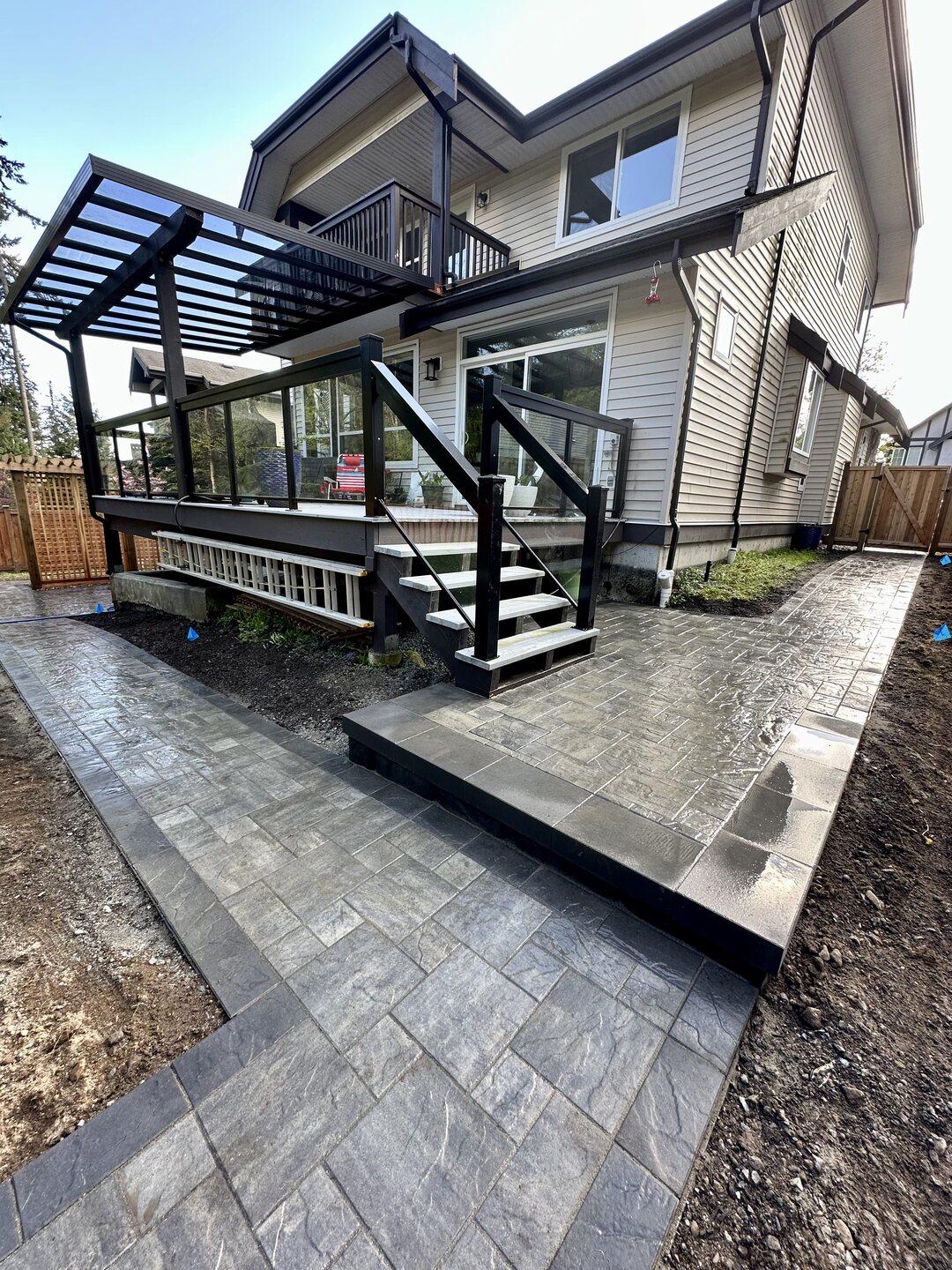 Concrete paver walkways and stairs in North Vancouver built by Benjamin Landscaping and Projects. We pride ourselves in being the best paver contractor in the city. Port Moody, Coquitlam, White Rock, Surrey, Langley, West Vancouver, Port Moody.