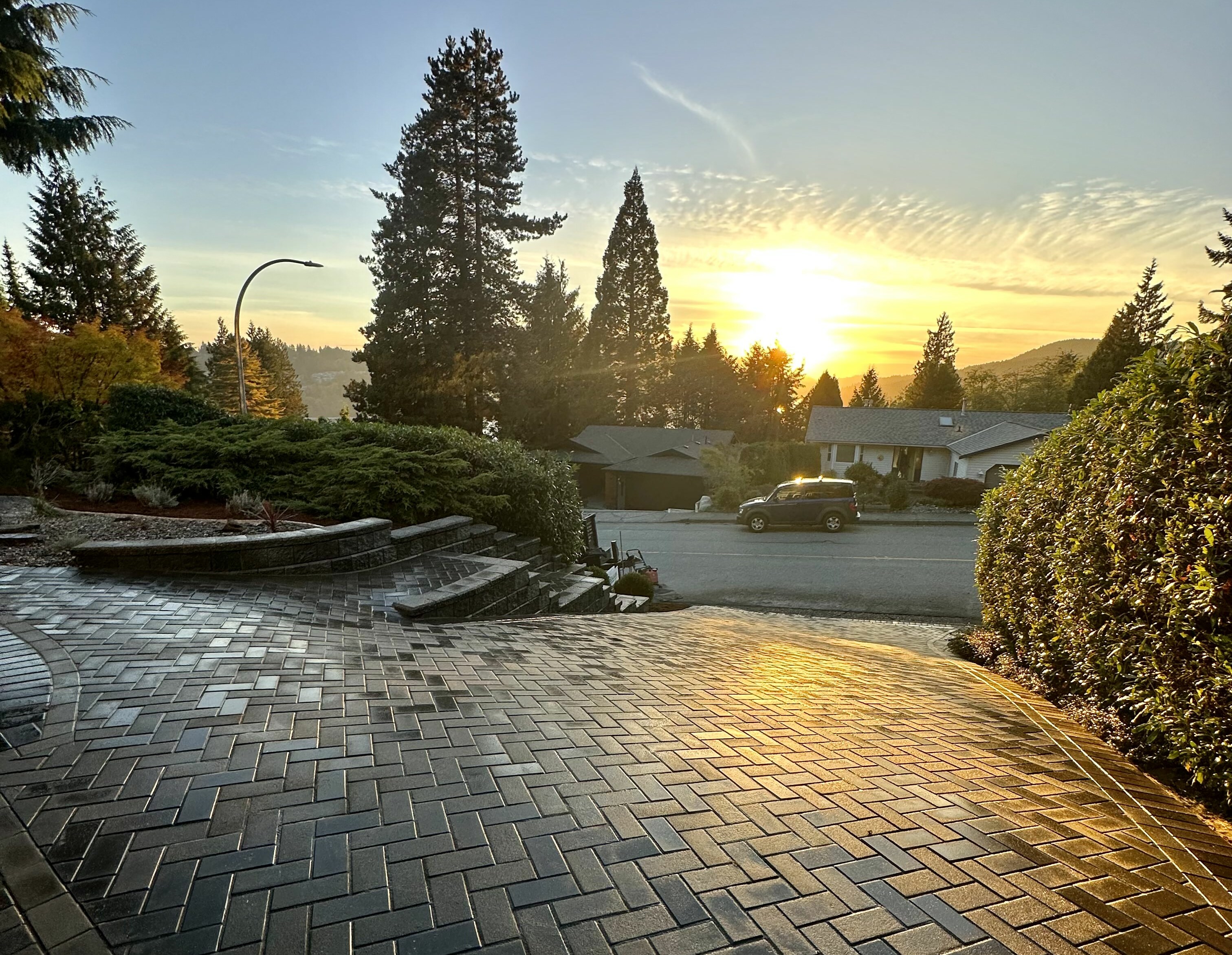 Interlocking paver driveway in Port Moody completed by Benjamin Landscaping and Projects.