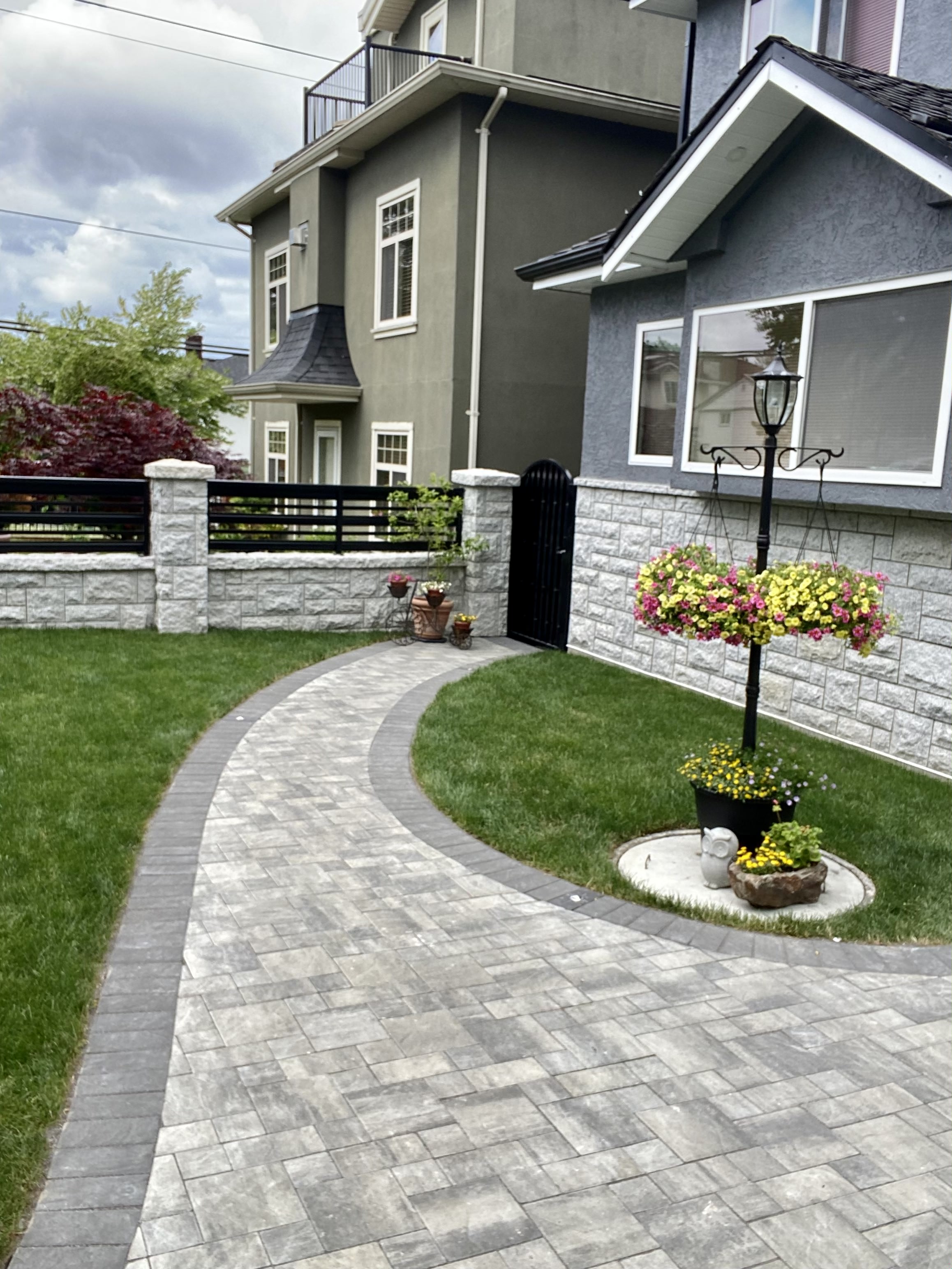 Vancouver landscape completed with interlocking pavers. Benjamin Landscaping and Projects. 