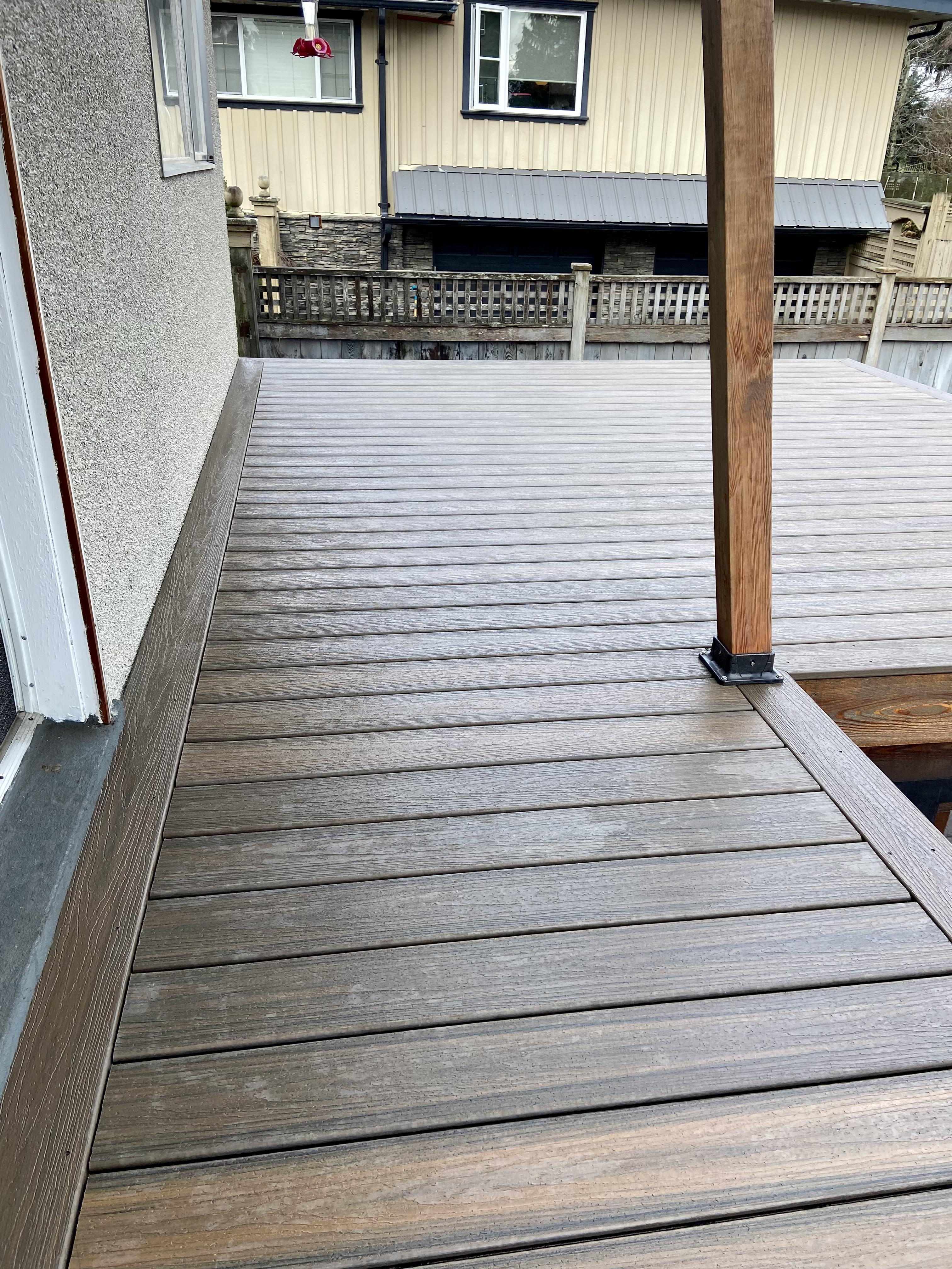 Composite deck in Coquitlam. Benjamin Landscaping and Projects. 