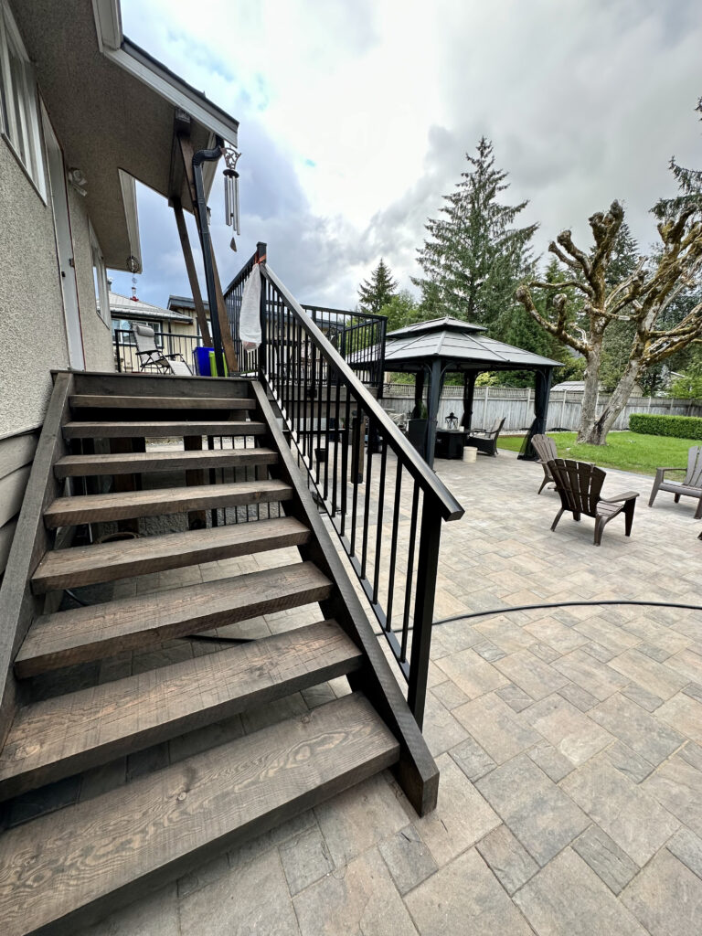 Stairs and deck in Coquitlam built by Benjamin Landscaping and Projects.