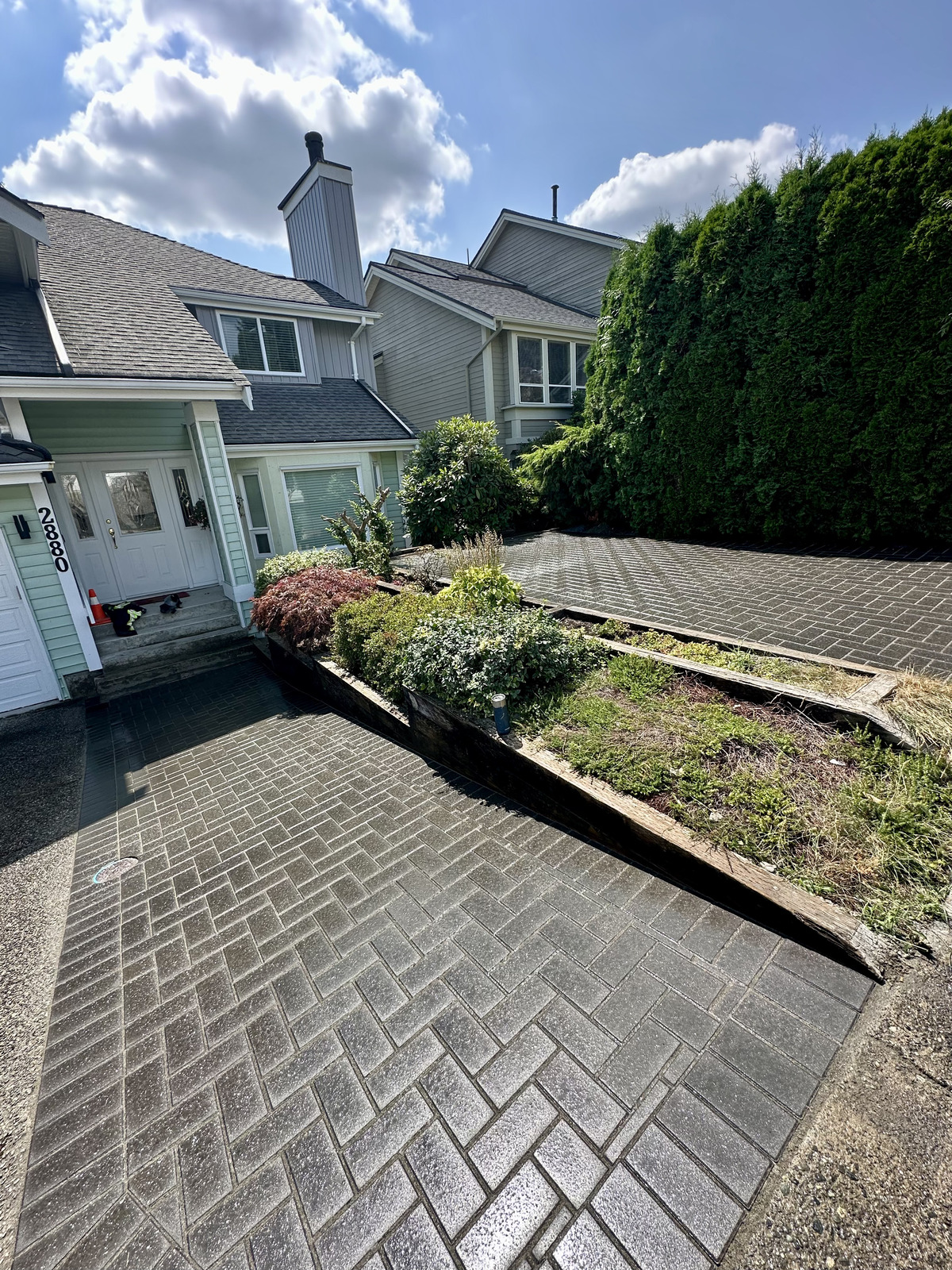 interlocking paver driveway extension in North Vancouver by Benjamin Landscaping and Projects.