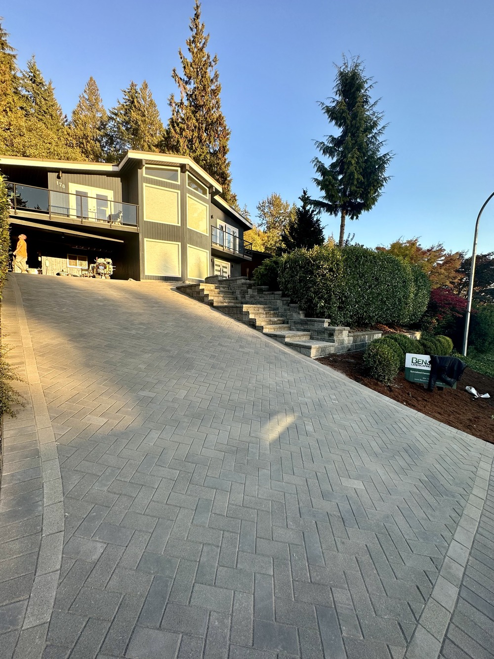 Steep interlocking paver driveway and stairs in Port Moody BC. Benjamin Landscaping and Projects. 